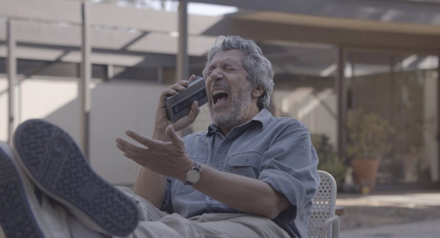 Alain Chabat laughing in Reality movie
