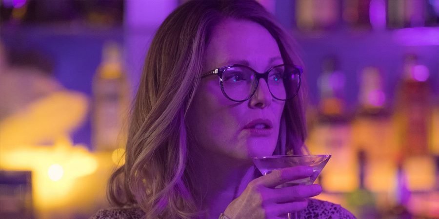 Julianne Moore wearing glasses and holding a glass in Sebastián Lelio's Gloria Bell 2019 