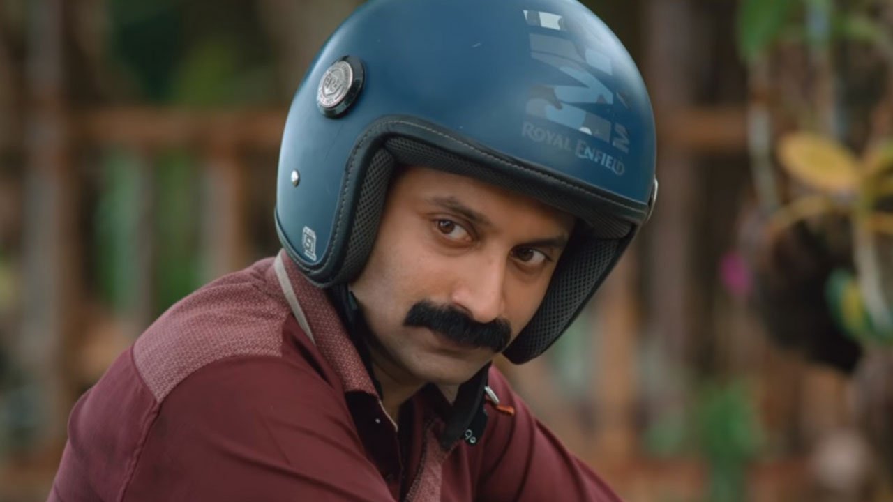 Fahadh Faasil wearing helmet on the bike in Kumbalangi Nights Indian Movies 2019