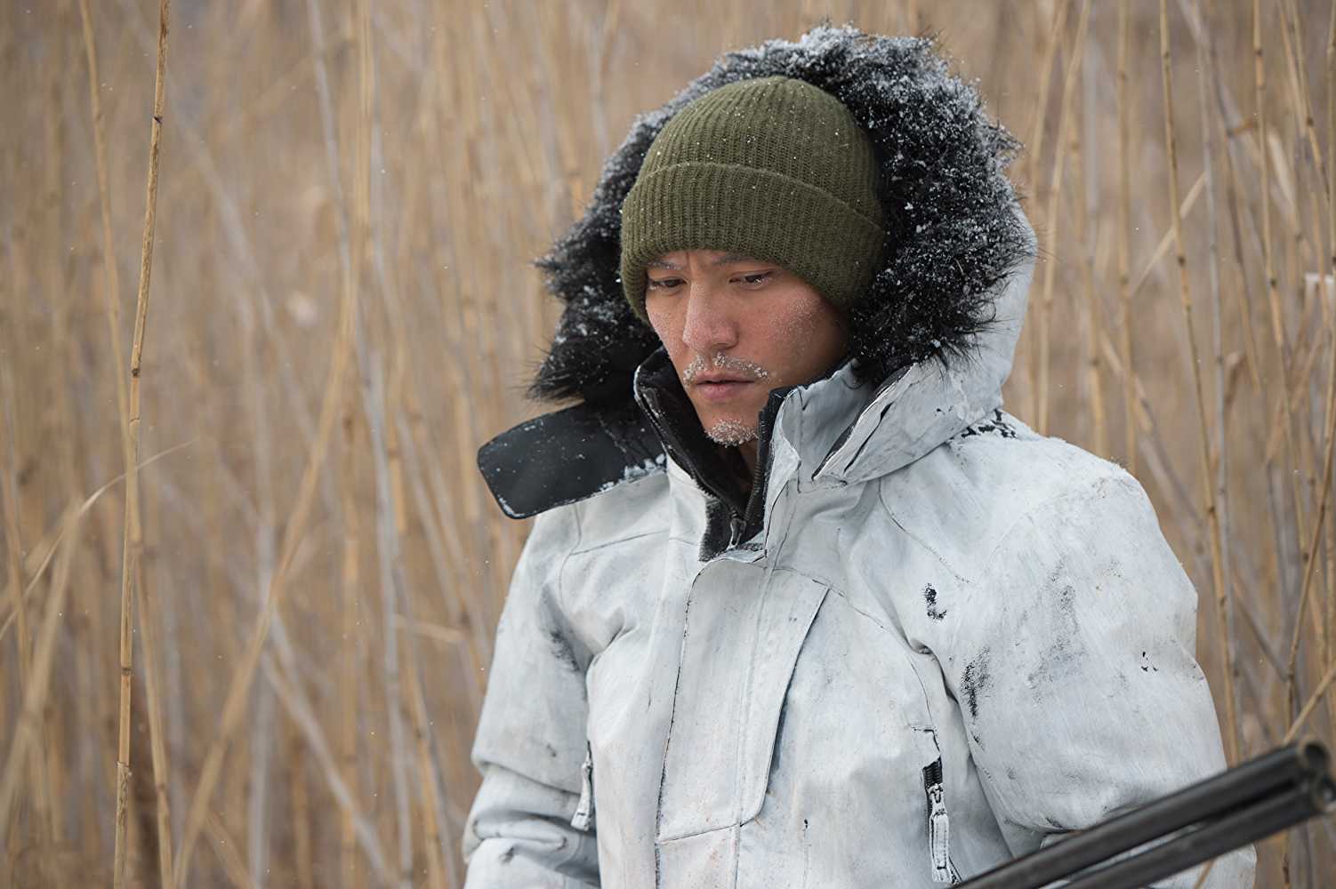 Chang Chen as Wang in Savage