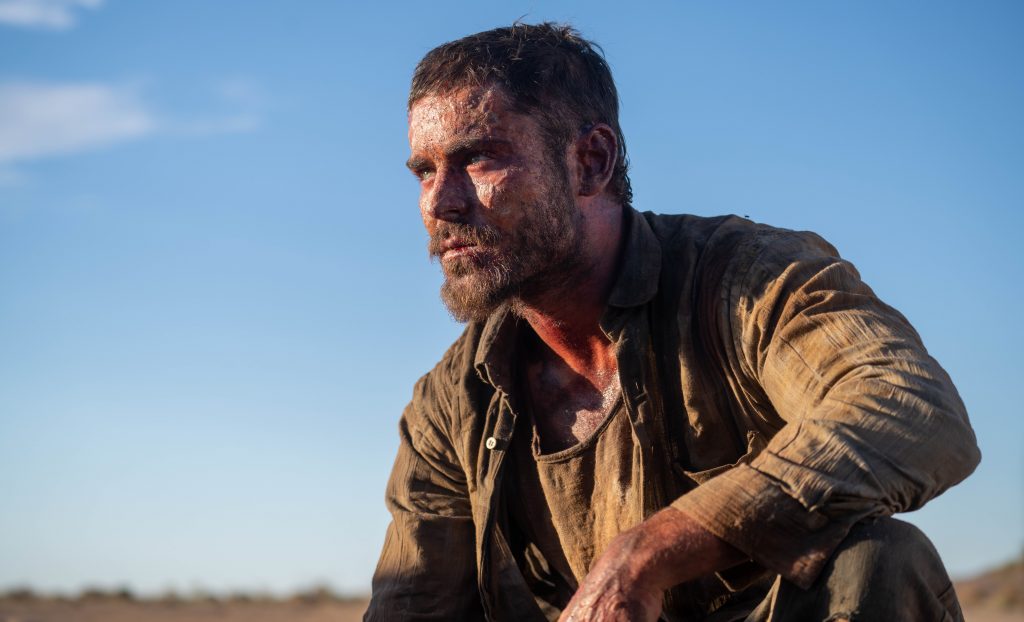 Gold (2022) - Efron as Man One