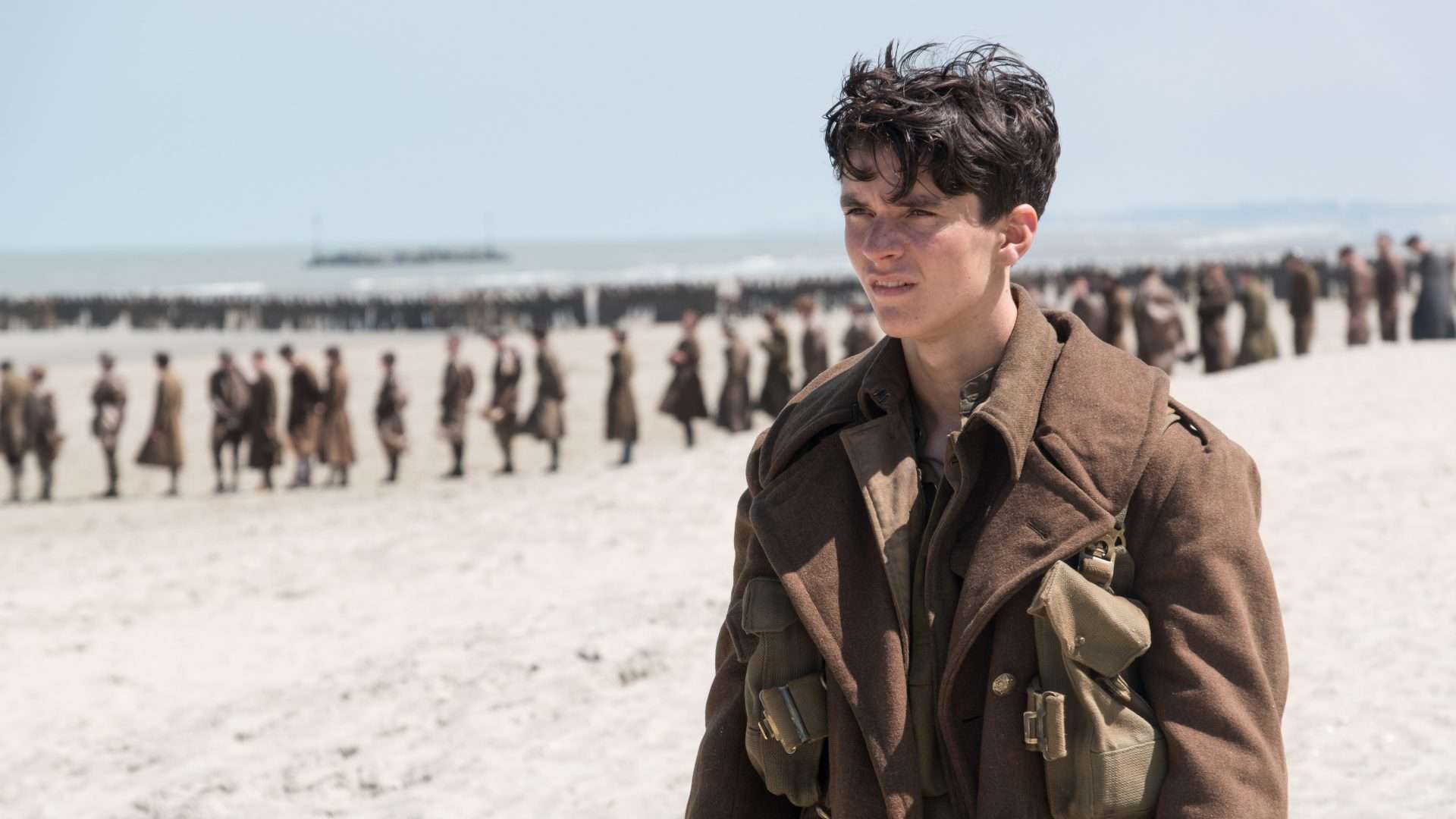 Fionn Whitehead plays Tommy, a British soldier awaiting evacuation, in Christopher Nolan's Dunkirk