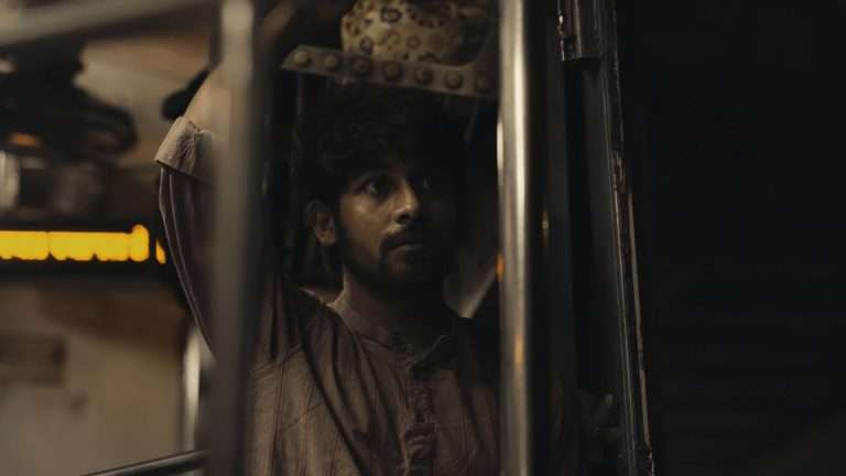 A Ride in the Rain (2023) ‘KIFF’ Short Film Review: An Exploration of A Moment of the Intersection of Many Lives 
