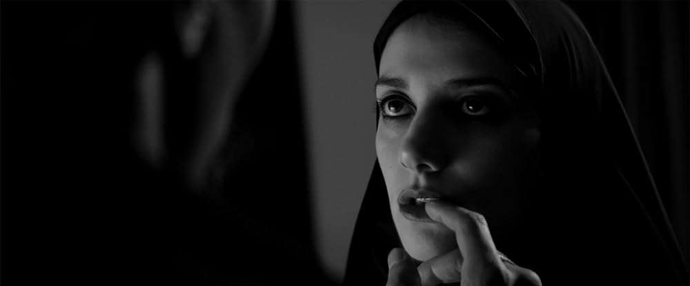 Placing "A Girl Walks Home Alone At Night" within “The Girls of Revolution Street” Protests of Iran