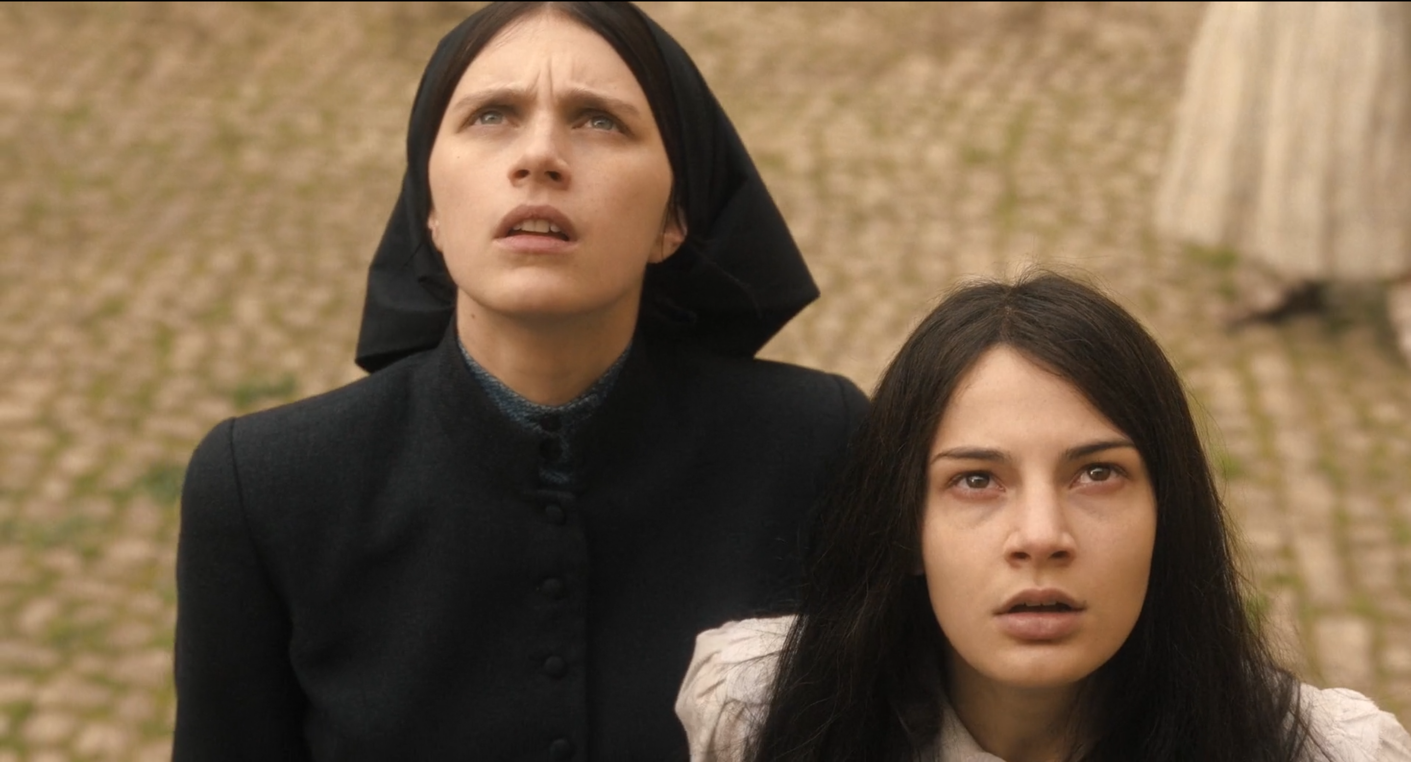 Nell Tiger Free as Margaret and Nicole Sorace as Carlita in The First Omen (2024).