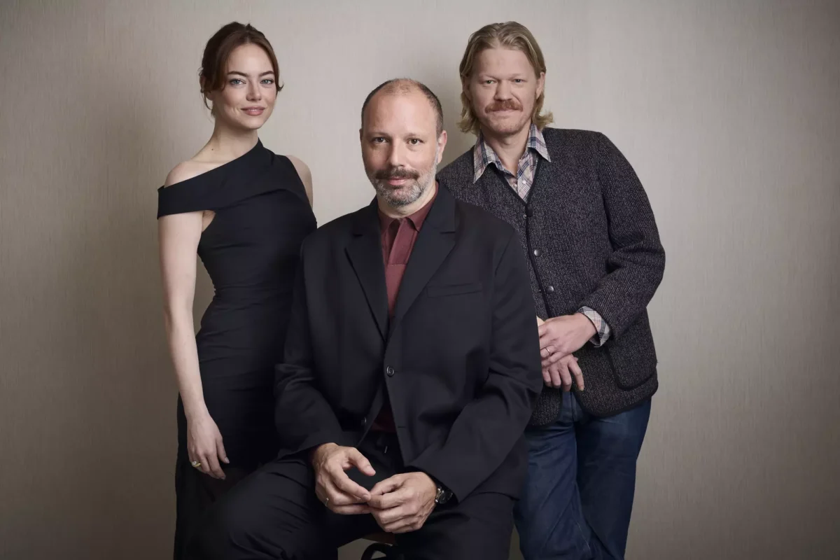 Emma Stone, left, Yorgos Lanthimos and Jesse Plemons of “Bugonia.” (JSquared Photography / For The Times)
